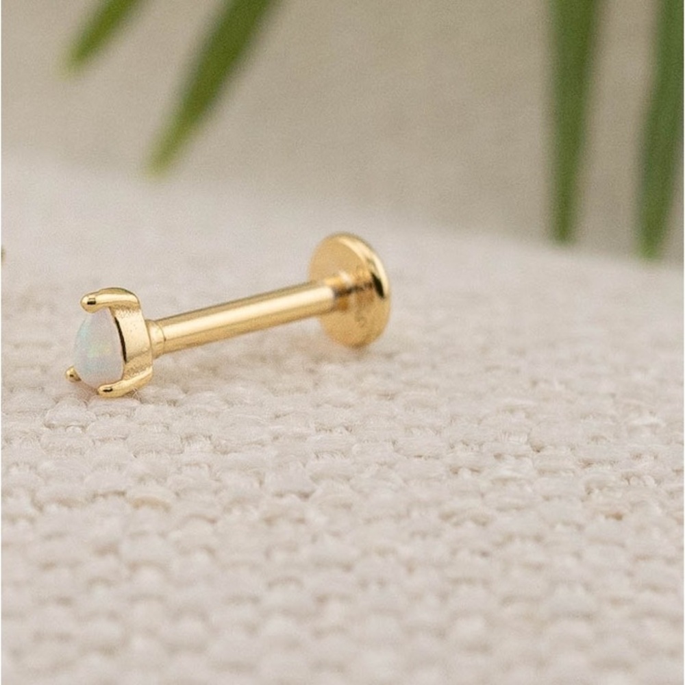 Brand new in box teardrop opal studs. 18g